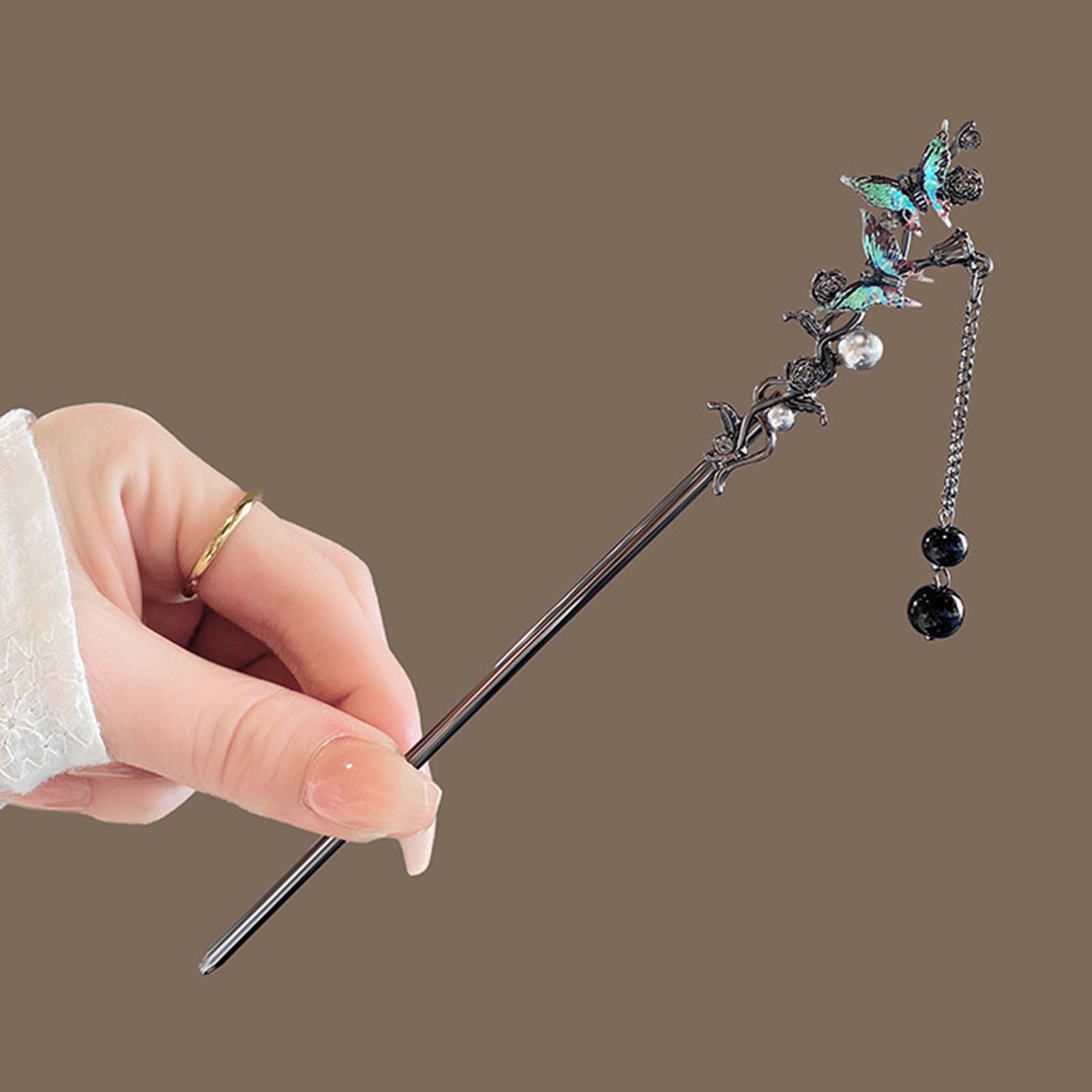 دبابيس شعر معدنية سوداء على ال - مراجعة Hair Fork Stick وسعره