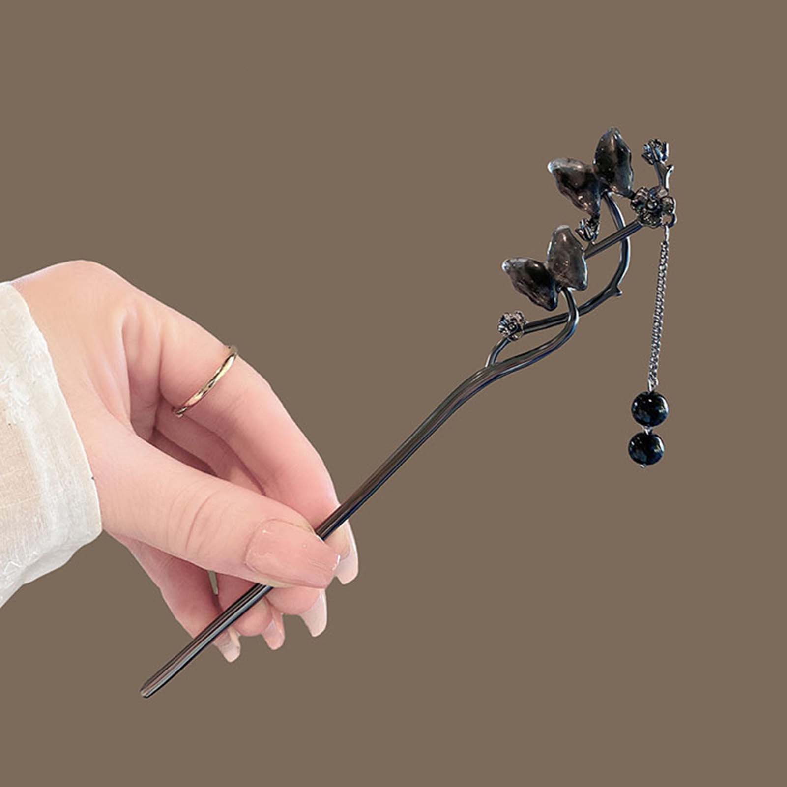 دبابيس شعر معدنية سوداء على ال - مراجعة Hair Fork Stick وسعره