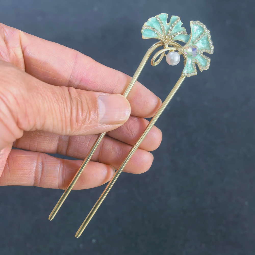 دبوس شعر معدني على شكل حرف U ب - مراجعة Hair Fork Stick وسعره